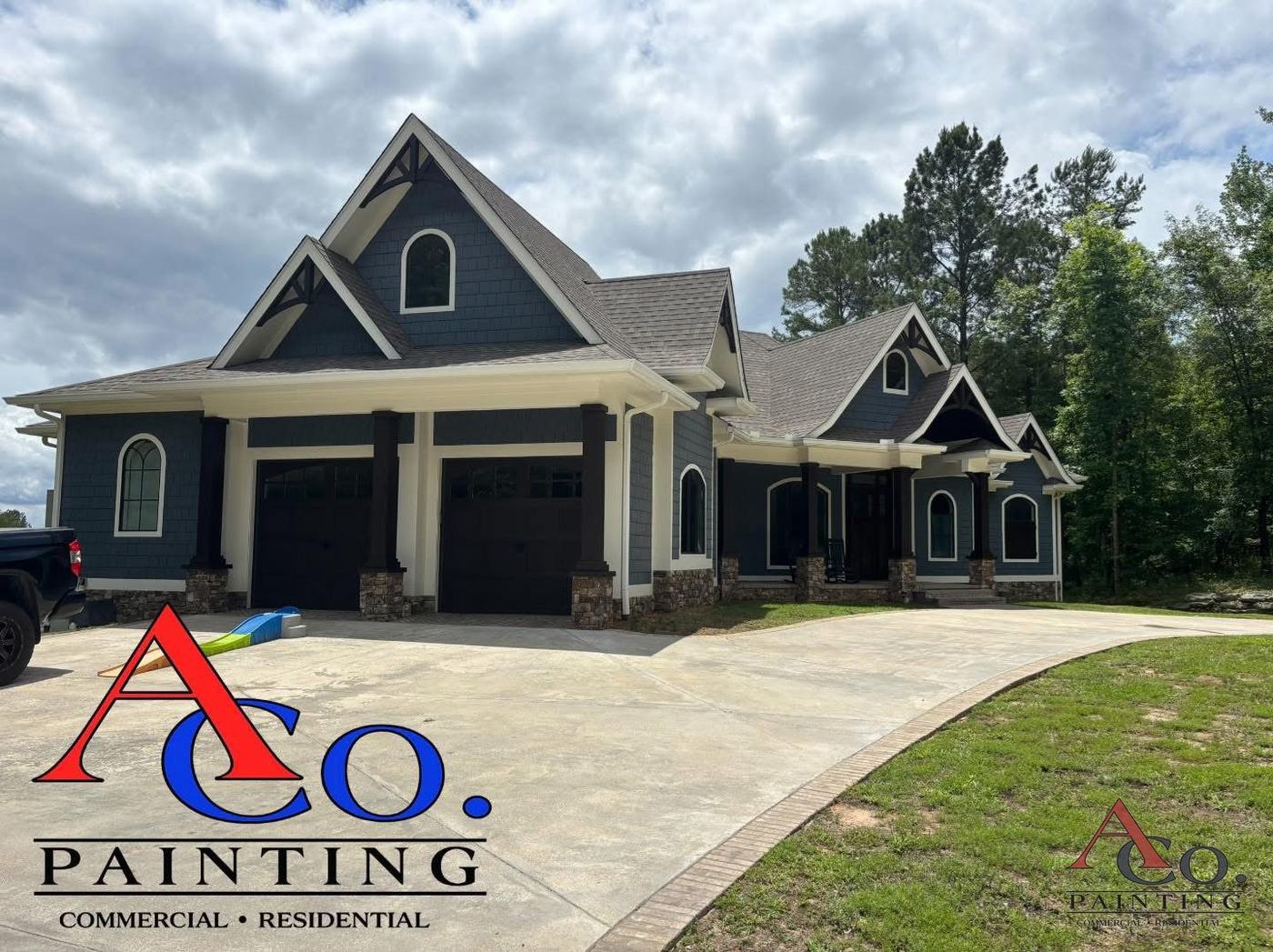 Repainted residential exterior with fresh siding, trim, and accent colors in Meridian, MS